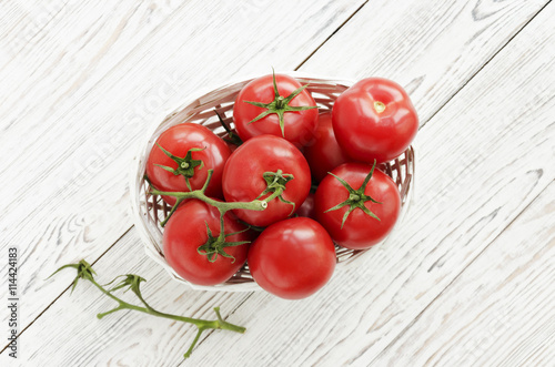 Red tomatoes in the basket