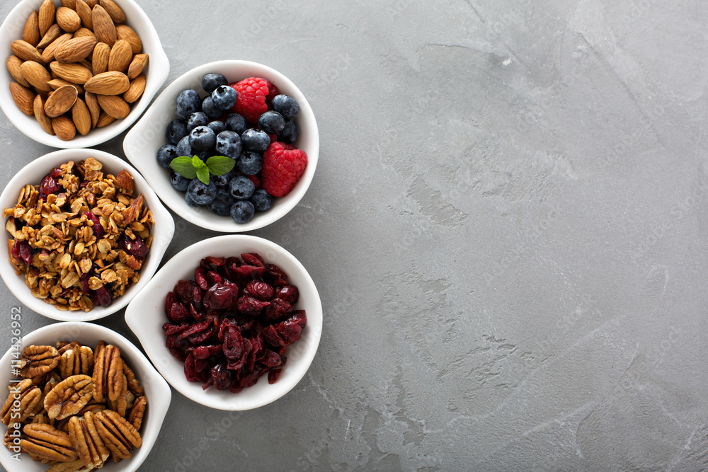 Variety of breakfast food in small bowls Variety of breakfast food in small bowls