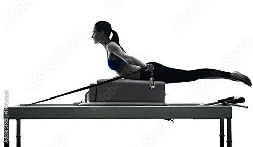 woman pilates reformer exercises fitness isolated photo