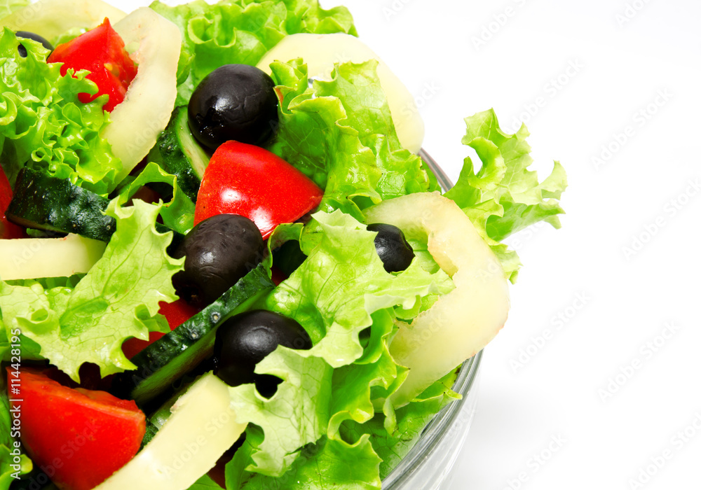 Fresh vegetable salad isolated on a white Fresh vegetable salad isolated on a white
