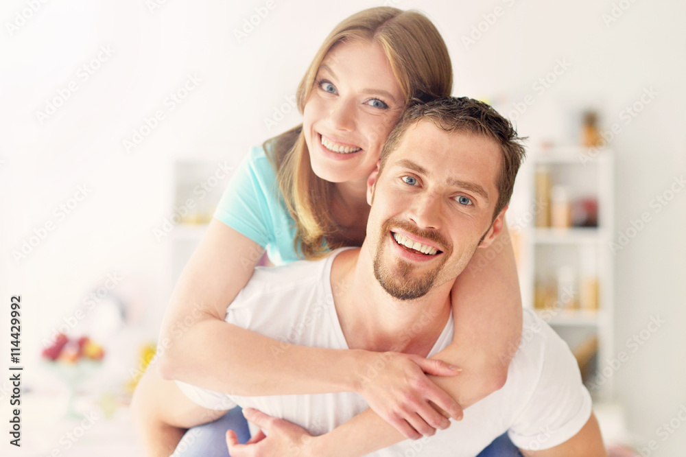young couple standing at home young couple standing at home