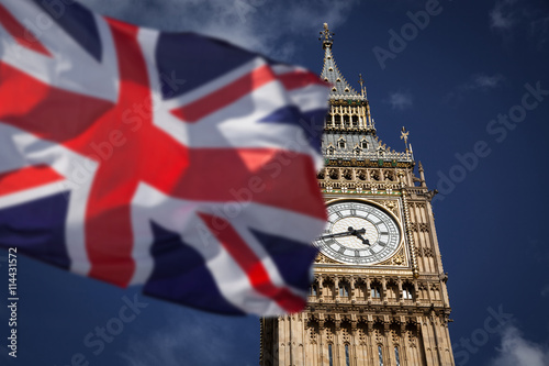 British union jack flag and Big Ben Clock Tower at city of westminster in the background - UK votes to leave the EU