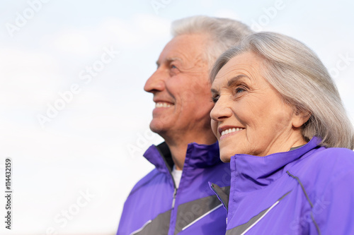 fit senior couple exercising