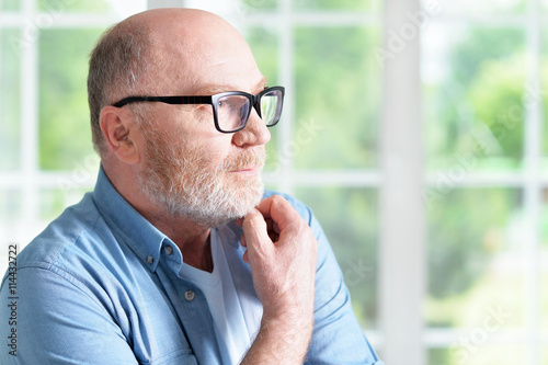 Senior man in glasses