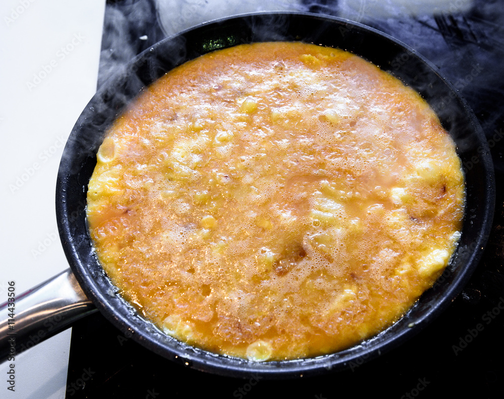 Making of Spanish tortilla, Spanish omelette tortilla de patata.