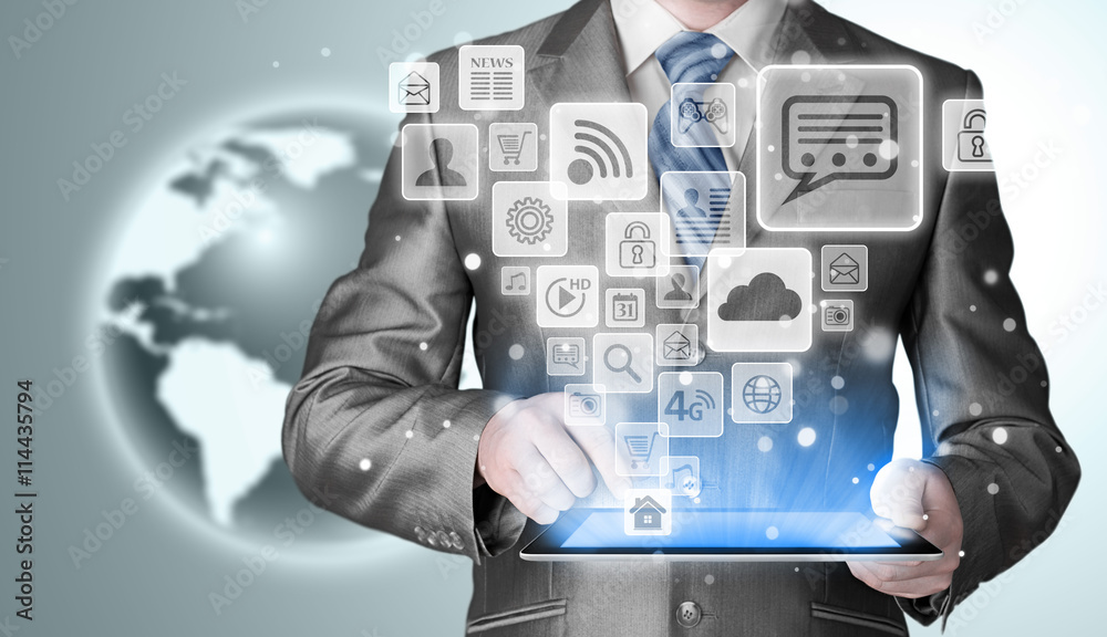 Business man using tablet PC with social media icon set Business man using tablet PC with social media icon set