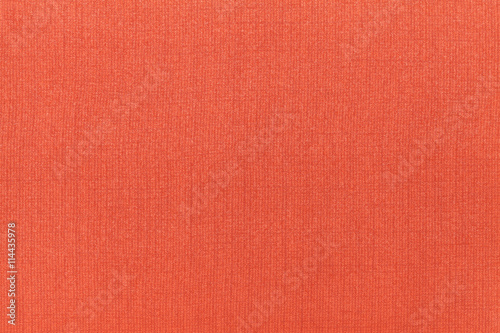 Bright orange ocher background from a textile material. Fabric with natural texture. Backdrop.