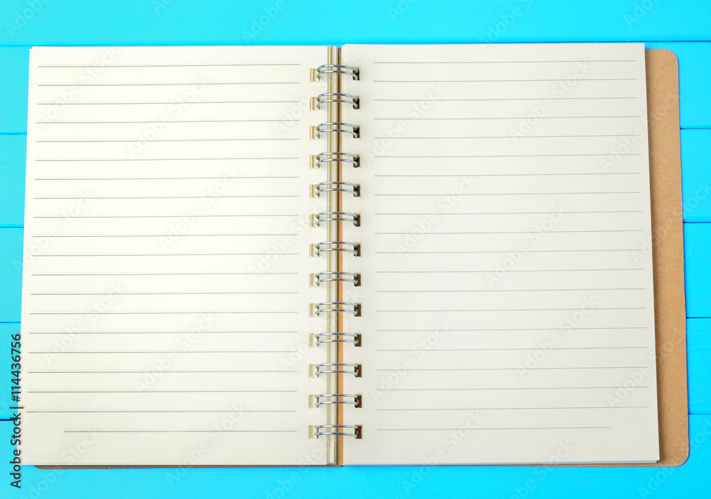 Empty notepad on table Empty notepad on table