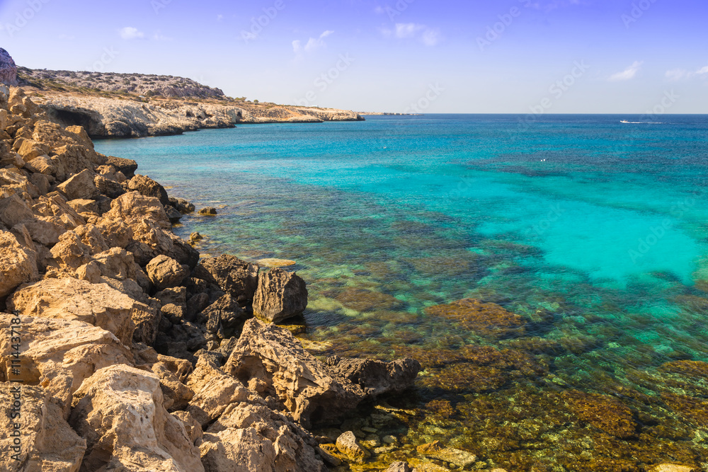 seashore - azure transparent sea and rocks . Cyprus