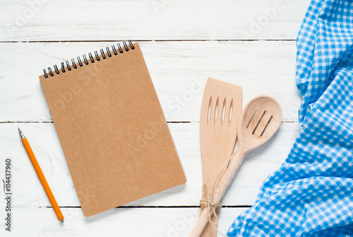 Cooking utensils on white wooden table