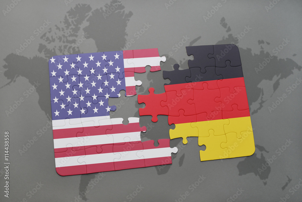 puzzle with the national flag of united states of america and germany ...