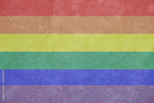 Gay Rainbow 8 stripe flag pattern on dirty old concrete wall tex