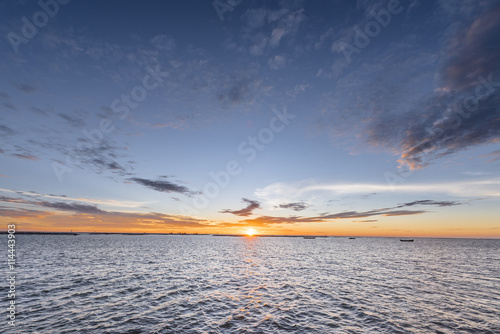 Sunset with beautiful clouds in the sea
