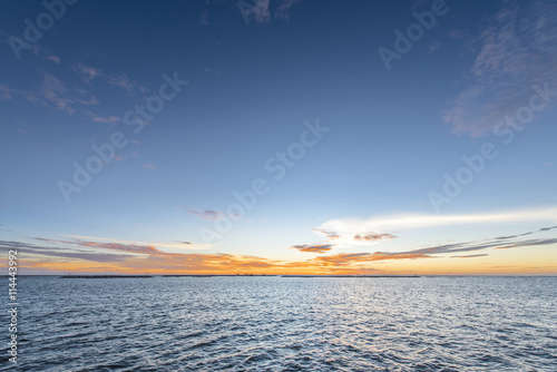 Sunset with beautiful clouds in the sea