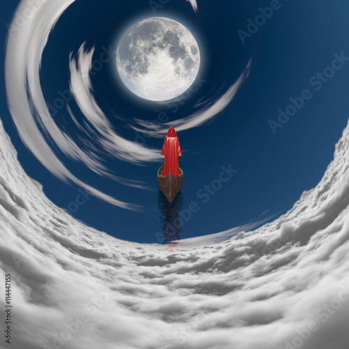 figure in red robe floating to fulll moon in clouds photo