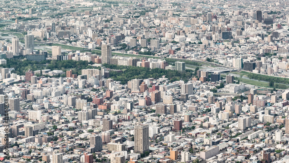 Sapporo city in the evening of springtime, View Sapporo from mount Moiwa Hokkaido Japan