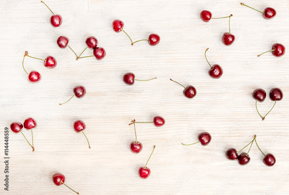 Cherries on the wooden background Cherries on the wooden background