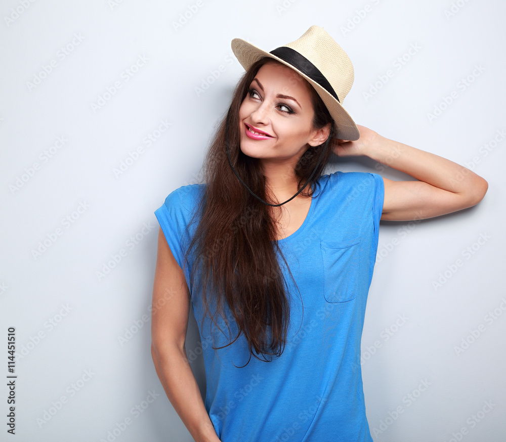 Relaxing fun smiling woman in hat thinking about summer holidays Relaxing fun smiling woman in hat thinking about summer holidays