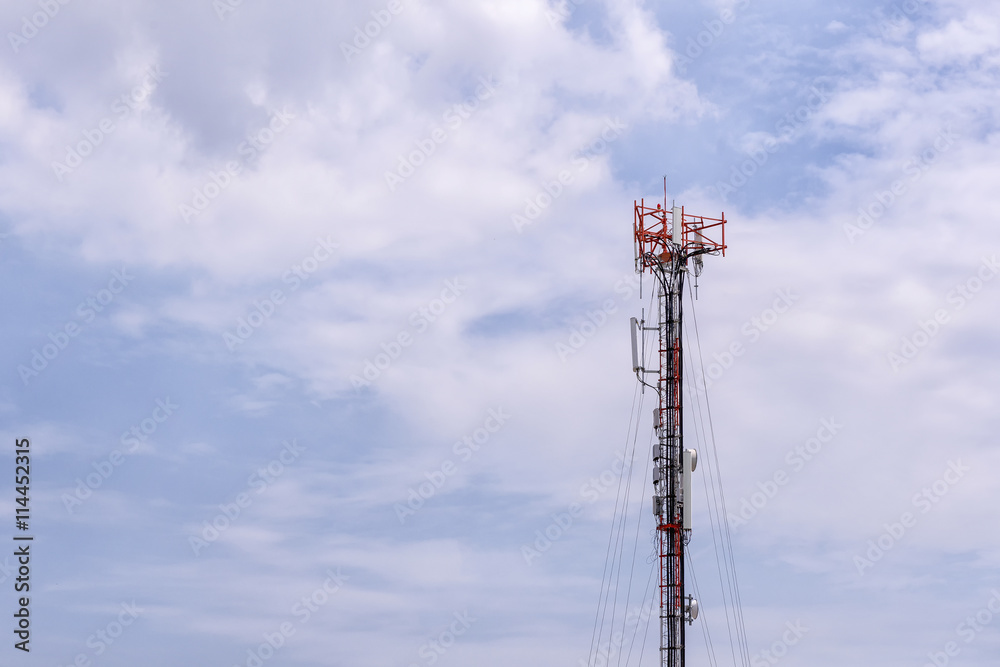 Antenna tower,antenna tower building with the blue sky.Close-up of the antenna building with the sky background.Communication antenna tower with the sky background in close-up scene.
