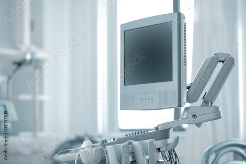 Modern ultrasound in hospital room photo