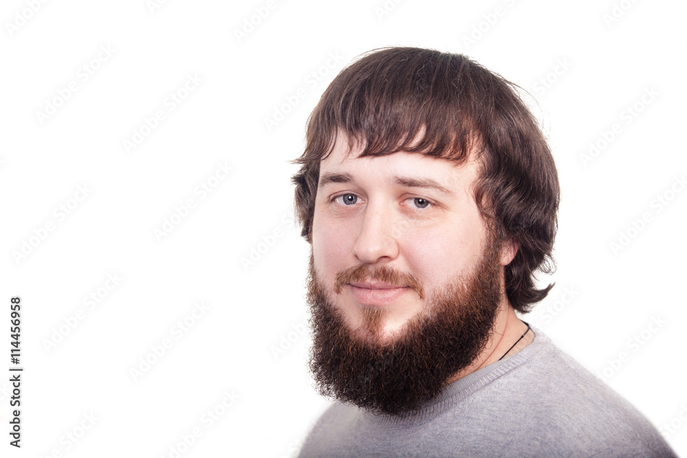 Bearded man confidently looking forward. Studio shot on white background Bearded man confidently looking forward. Studio shot on white background