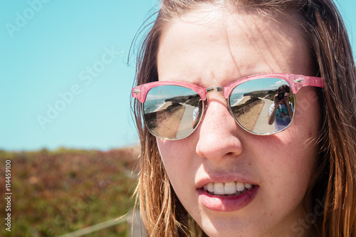 Pretty Girl With Sunglasses Near Beach in California