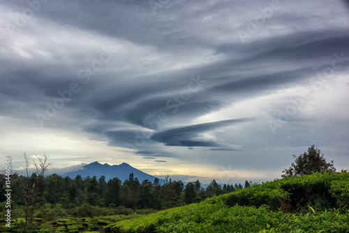 Dramatic sky over rural landscape, Puncak, Indonesia photo