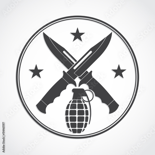 military symbol of crosed knives and grenade 