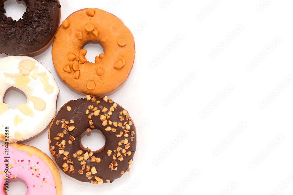 Delicious donuts with icing isolated on white Delicious donuts with icing isolated on white
