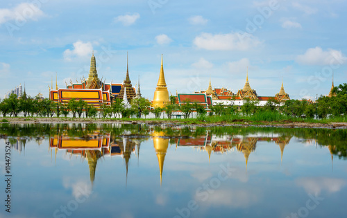 Wat Phra Kaew temple reflection with blue sky in Bangkok, Thailand.  photo