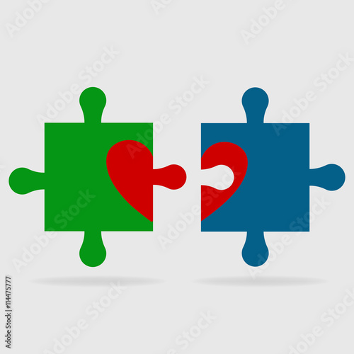 Puzzle vector illustrator color pieces with red heart shape.

