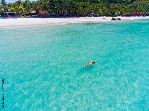 Woman at water surface