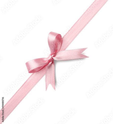 Pink ribbon bow on white background