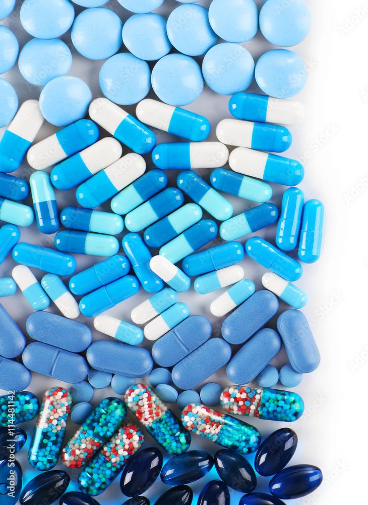 Blue pills isolated on white