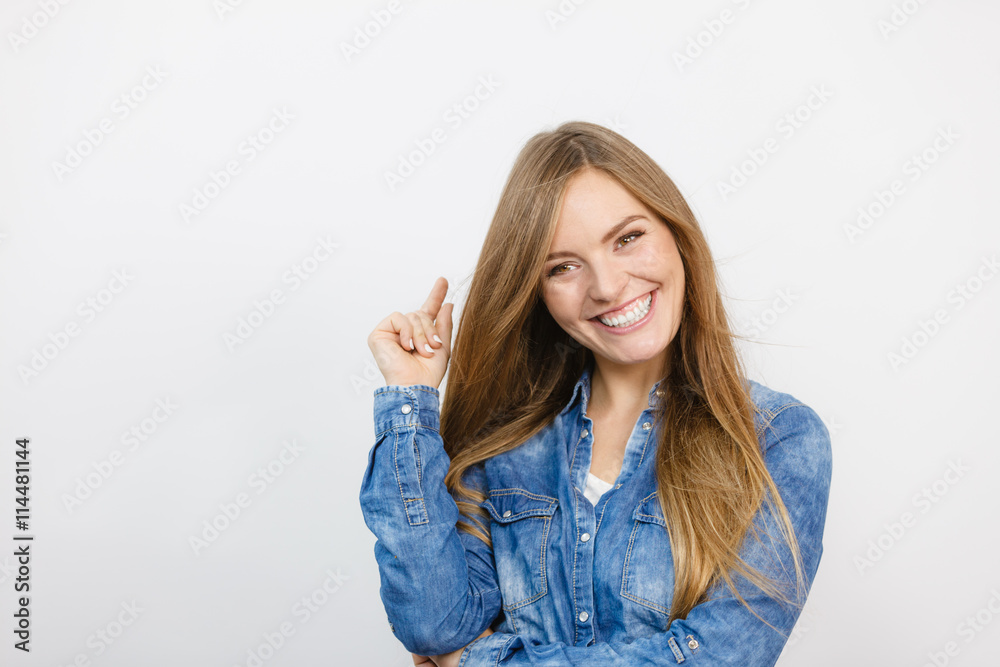 Cheerful young lady is smiling. Cheerful young lady is smiling.