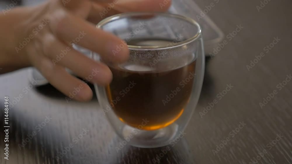 Tea tasting after finishing job slow motion 1080p FullHD footage - Panning on glass of tea taking 1920X1080 HD slow-mo video Tea tasting after finishing job slow motion 1080p FullHD footage - Panning on glass of tea taking 1920X1080 HD slow-mo video
