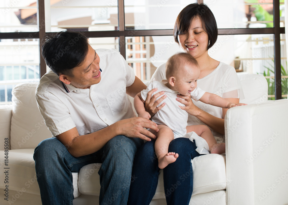 asian parent with smelly baby diaper asian parent with smelly baby diaper