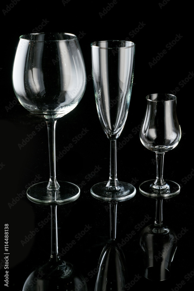 different glasses on a black background different glasses on a black background