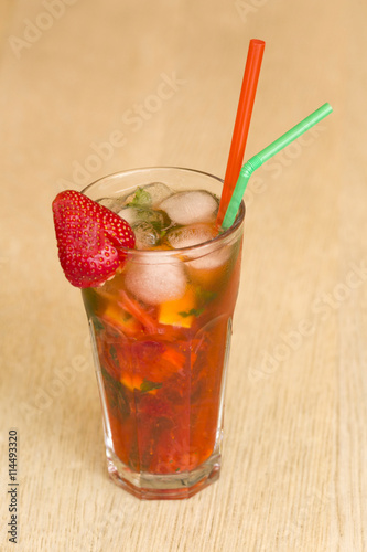 Strawberry mojito cocktal on wood background photo