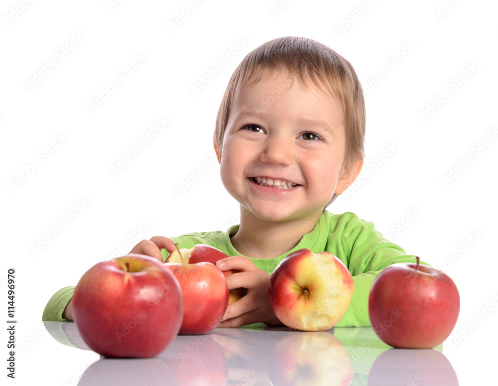 Cute child with red apples on white background Cute child with red apples on white background
