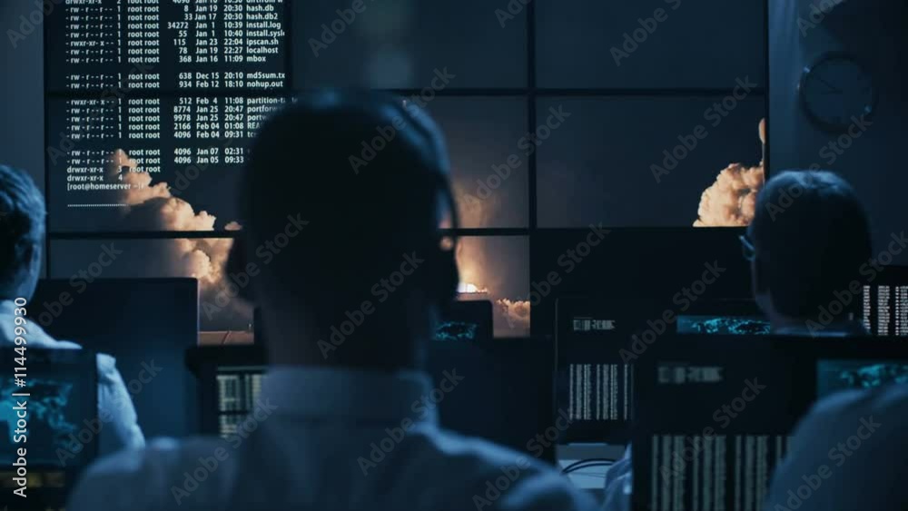 Group of People in Mission Control Center filled with Displays, Celebrating Successful Rocket Launch. Elements of this image furnished by NASA