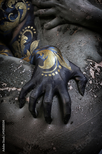 Fotografie body art young beautiful girl in style hohloma