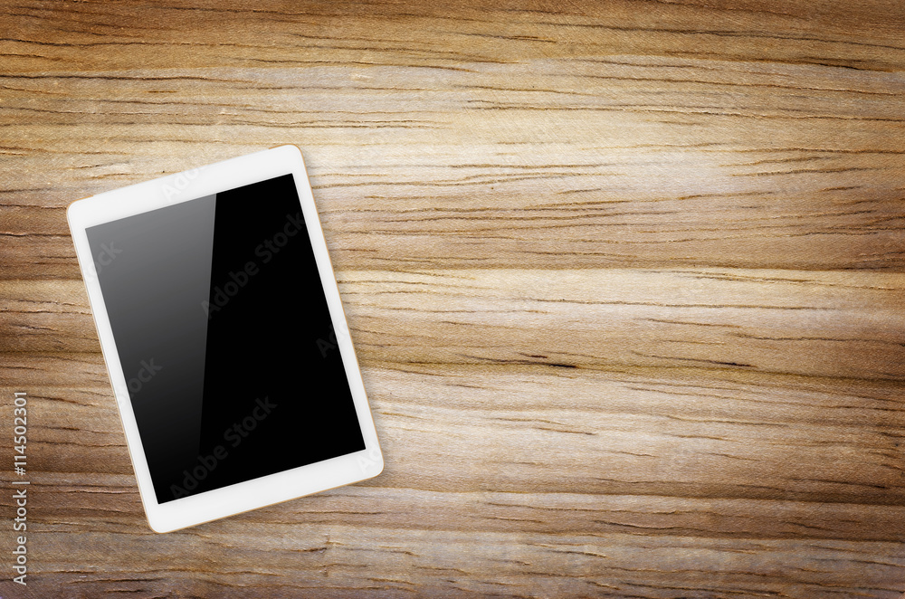 Digital tablet on wooden background. Digital tablet on wooden background.