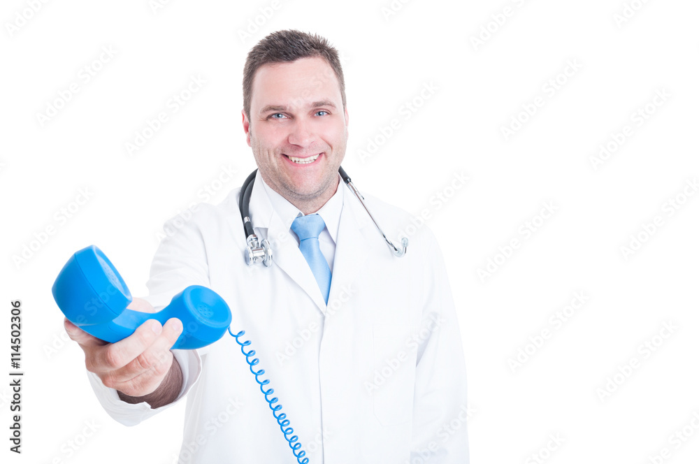 Male medic or doctor holding telephone receiver and smiling Male medic or doctor holding telephone receiver and smiling