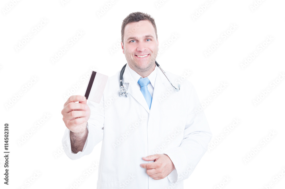 Male doctor or medic holding credit debit card Male doctor or medic holding credit debit card
