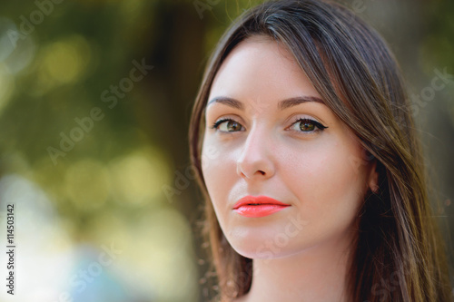 Stylish woman portrait in park , outdoors