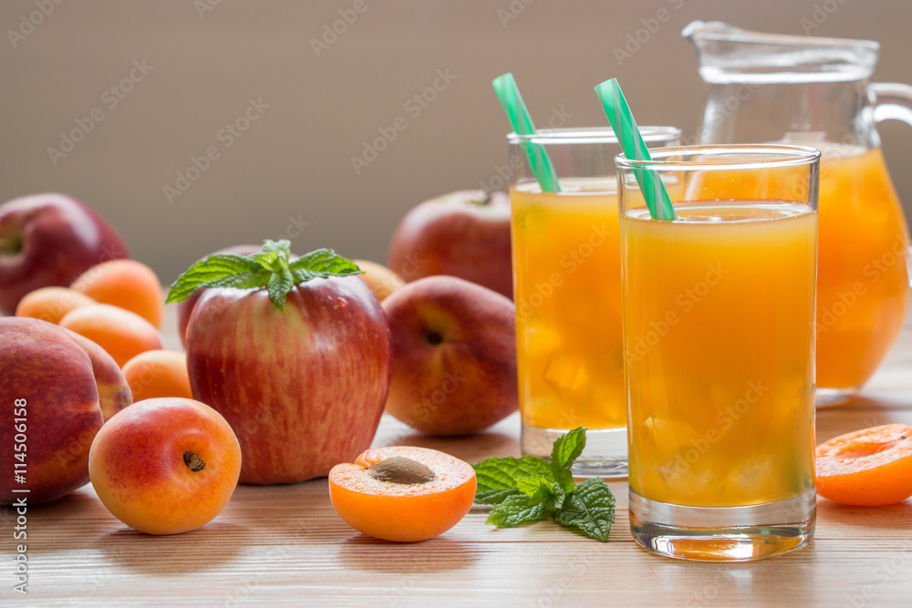 Apricot peach apple juice with ice. Apricot peach apple juice with ice.