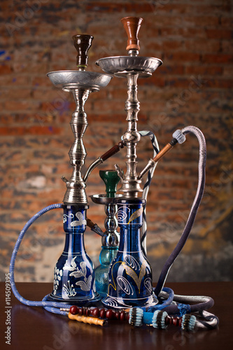 group of eastern hookahs on table © Roman Ribaliov