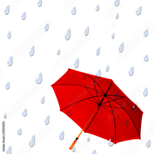 Background with large raindrops falling on large red umbrella.