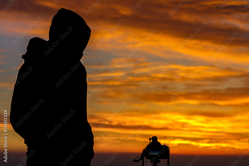 Silhouette of Photographer on Hilltop